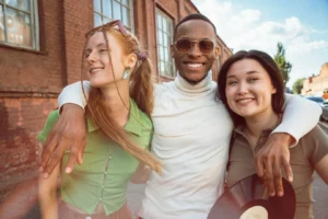 group of friends smiling while outdoors
